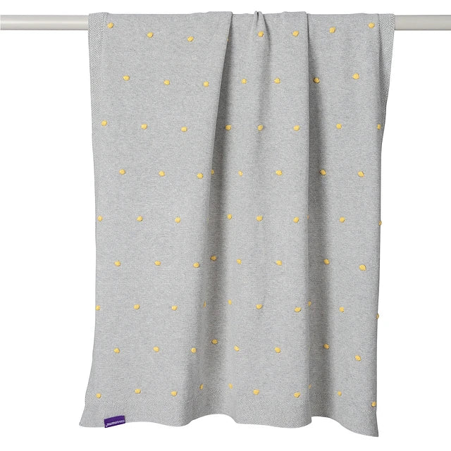 Manta Algodón Orgánico Pompones - Gris / Amarillo | ClevaMama